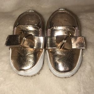 Rose gold Michael Kors crib shoe